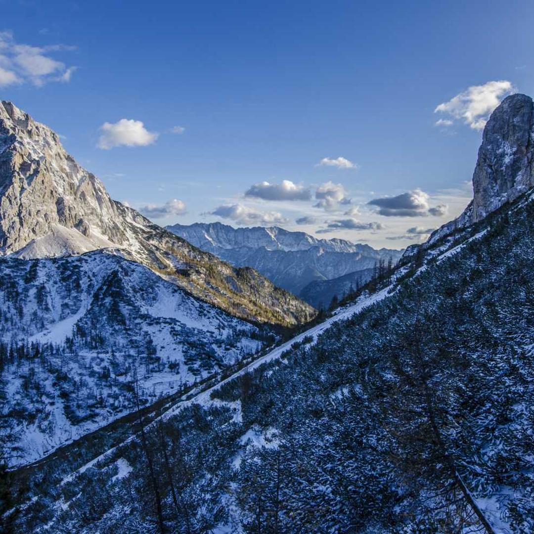 Snowy mountains with a snowboarder